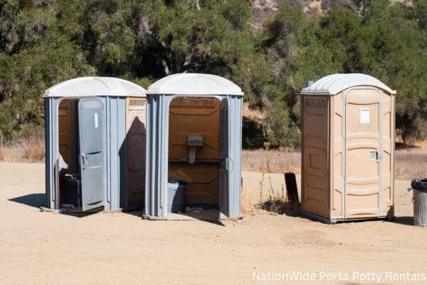 a clean row of portable restrooms for outdoor weddings or festivals in Hawaii